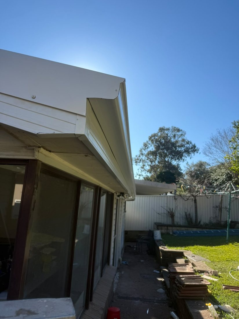 New quad gutter and fascia covers meeting at an external corner